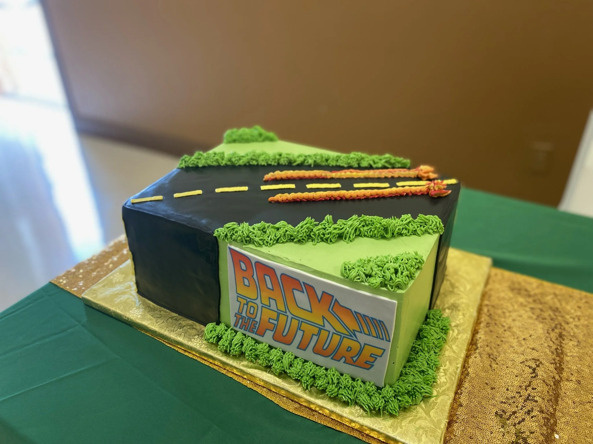 Green book shaped cake title