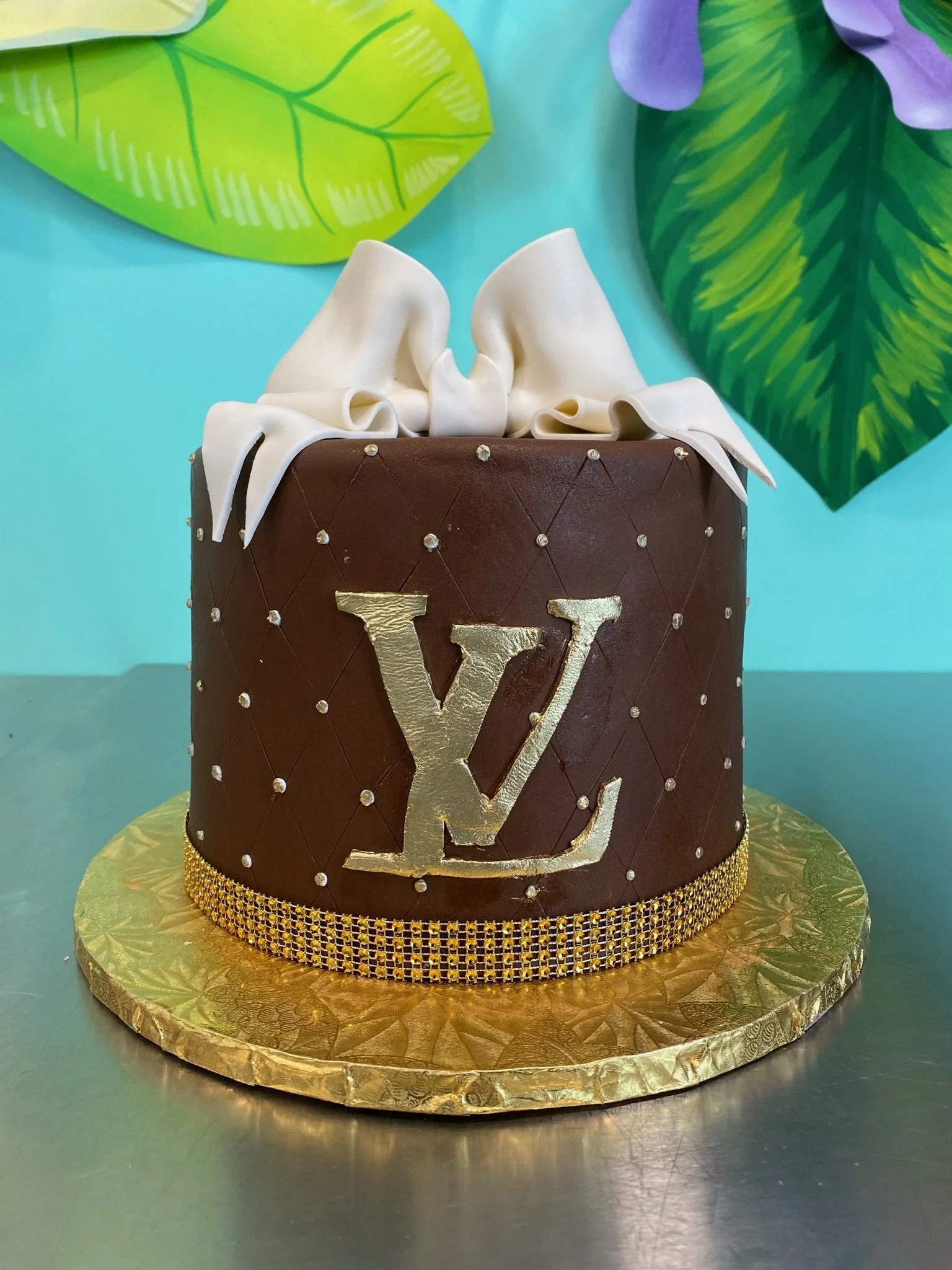 Brown designer louis vuitton logo cake