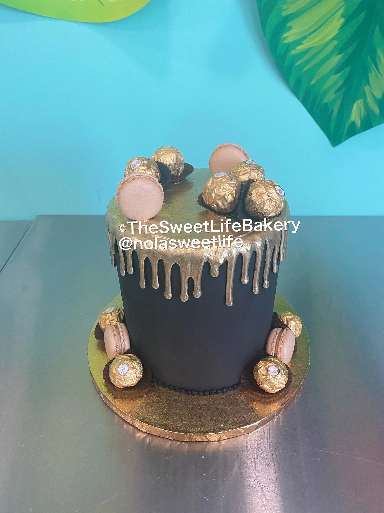 Dark navy gold drip luxury birthday cake