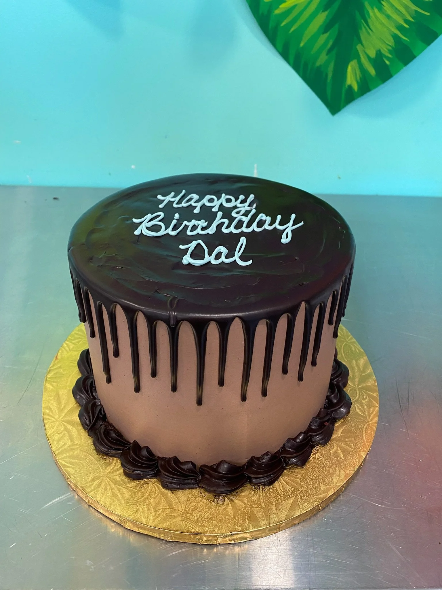 Black gold drip birthday cake