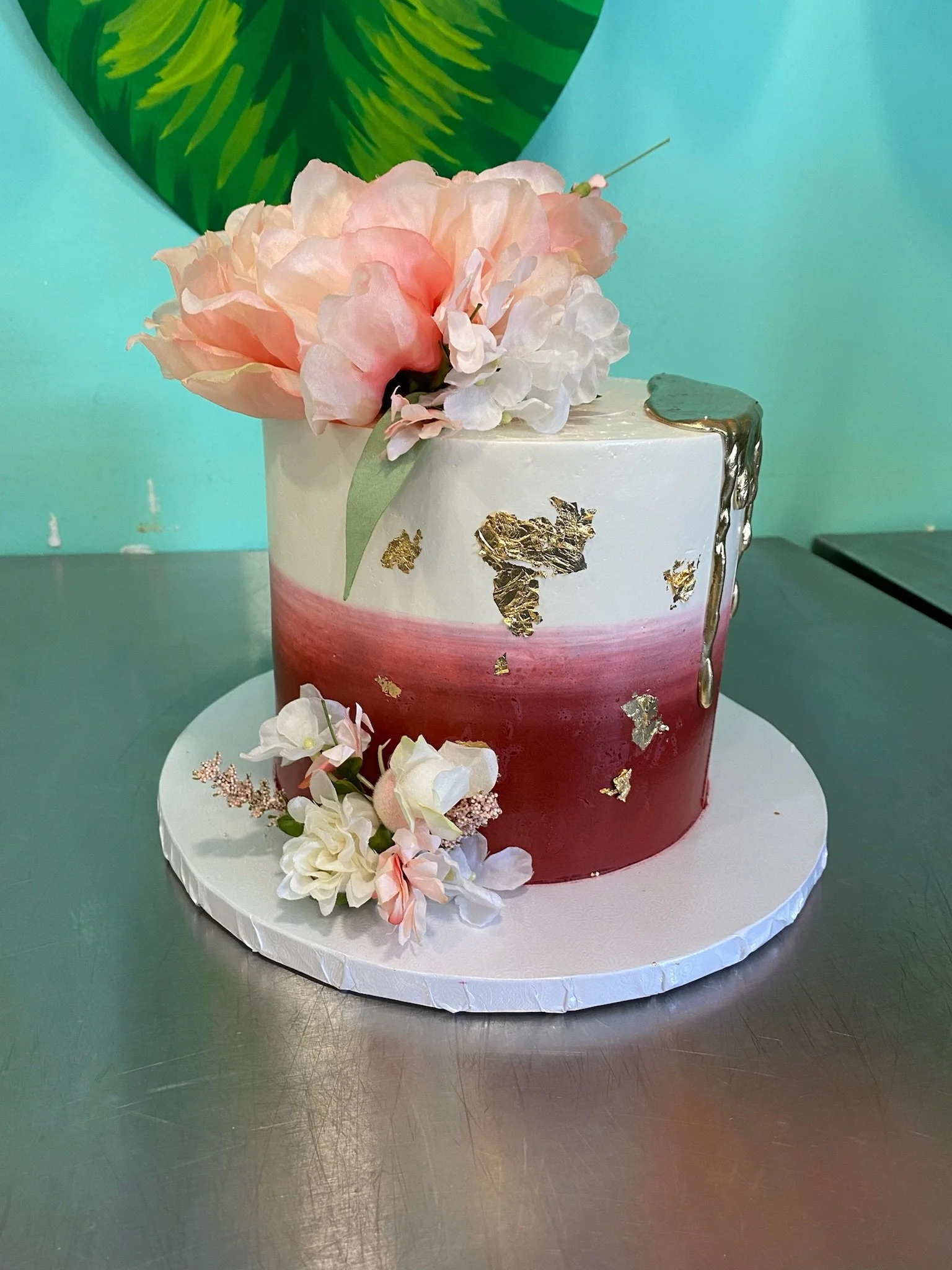White red pink flower chocolate drip cake