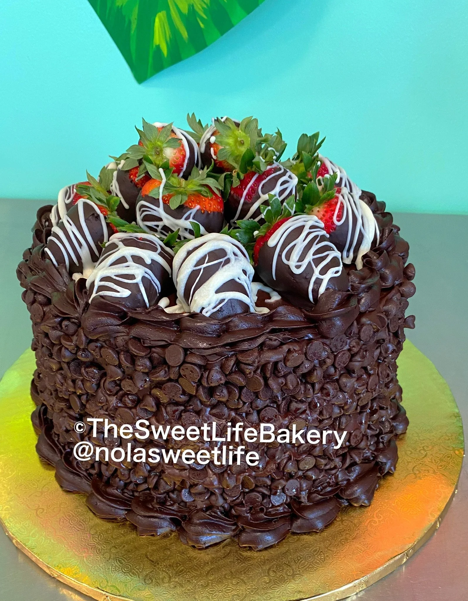 Chocolate dipped strawberries topped cake