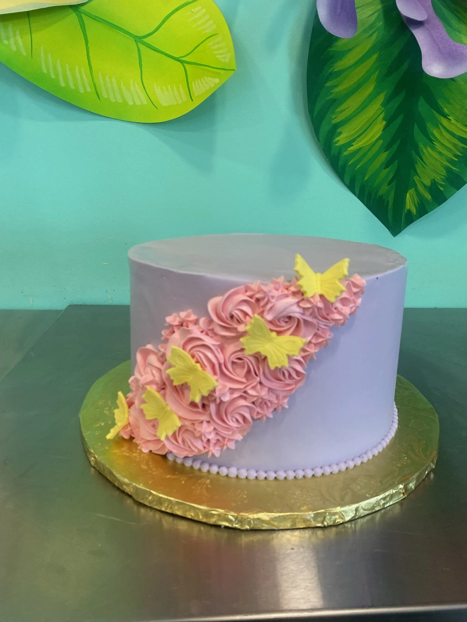 Purple pink floral cake gold butterflies