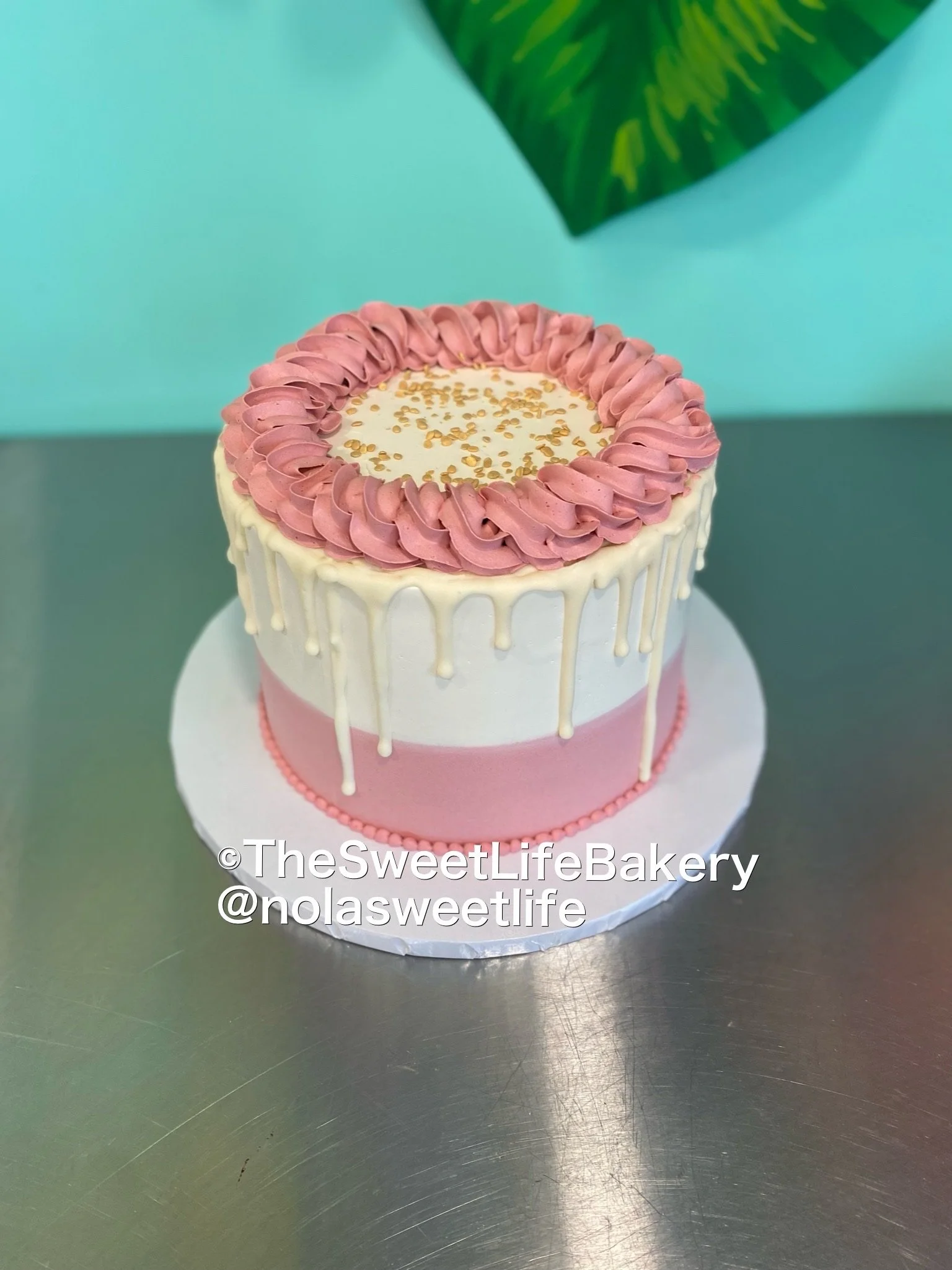 Pink white vintage buttercream cake