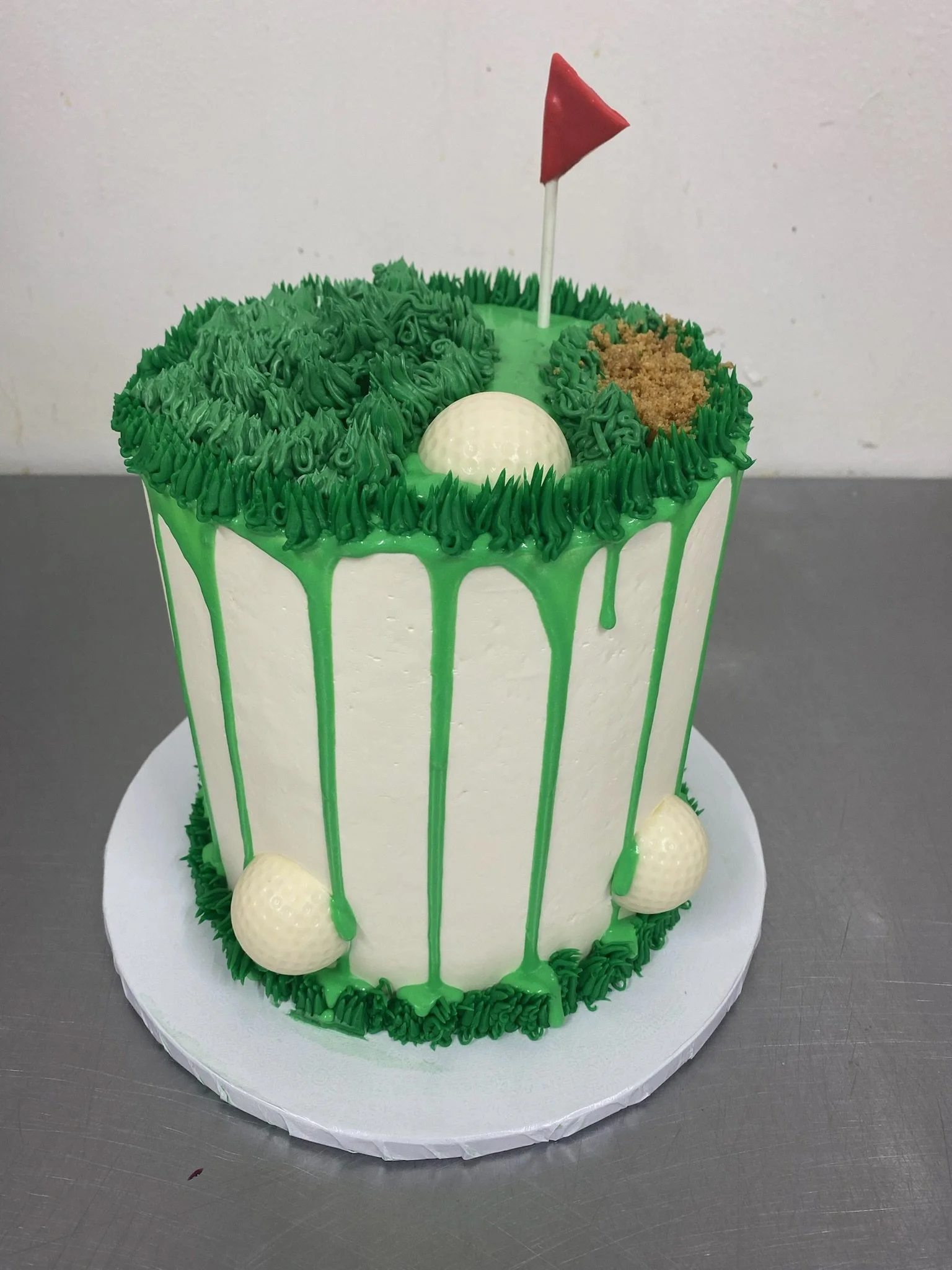 Green grass popcorn shaped birthday cake