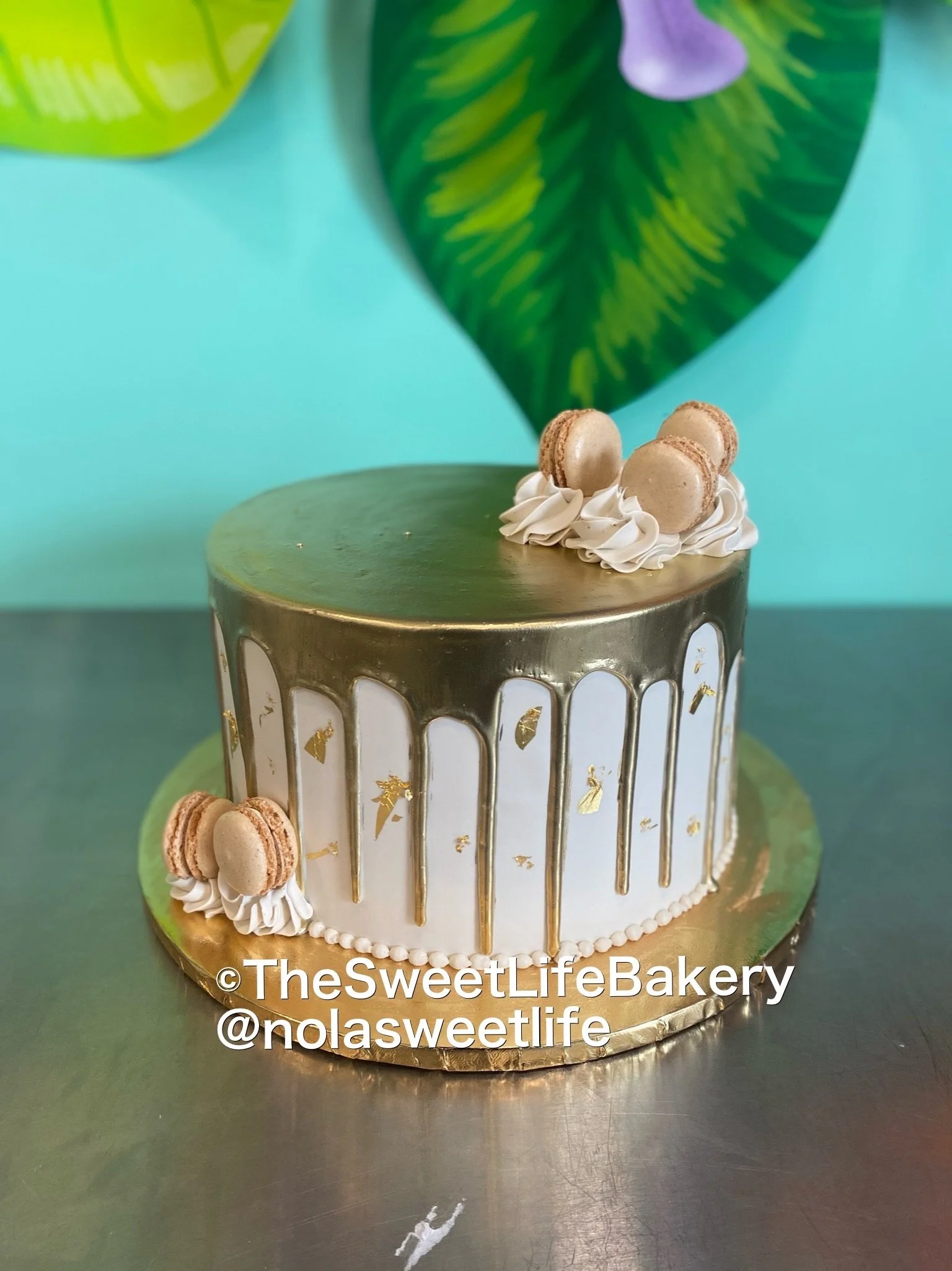 White gold chocolate drip cake macarons