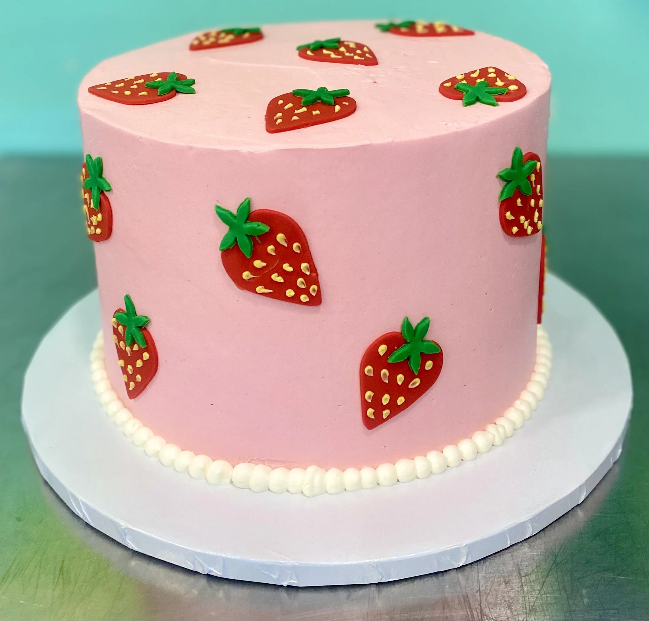 Pink strawberry pattern birthday cake