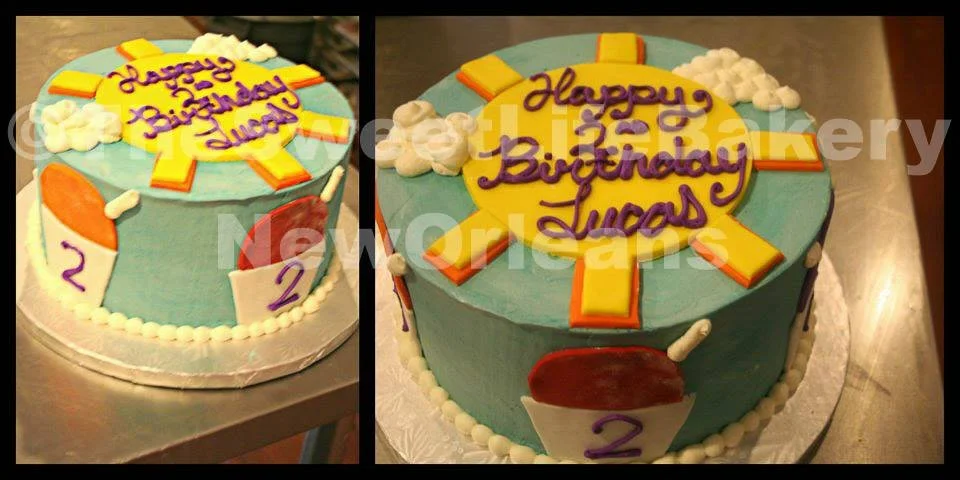 Blue yellow two birthday cakes disney theme