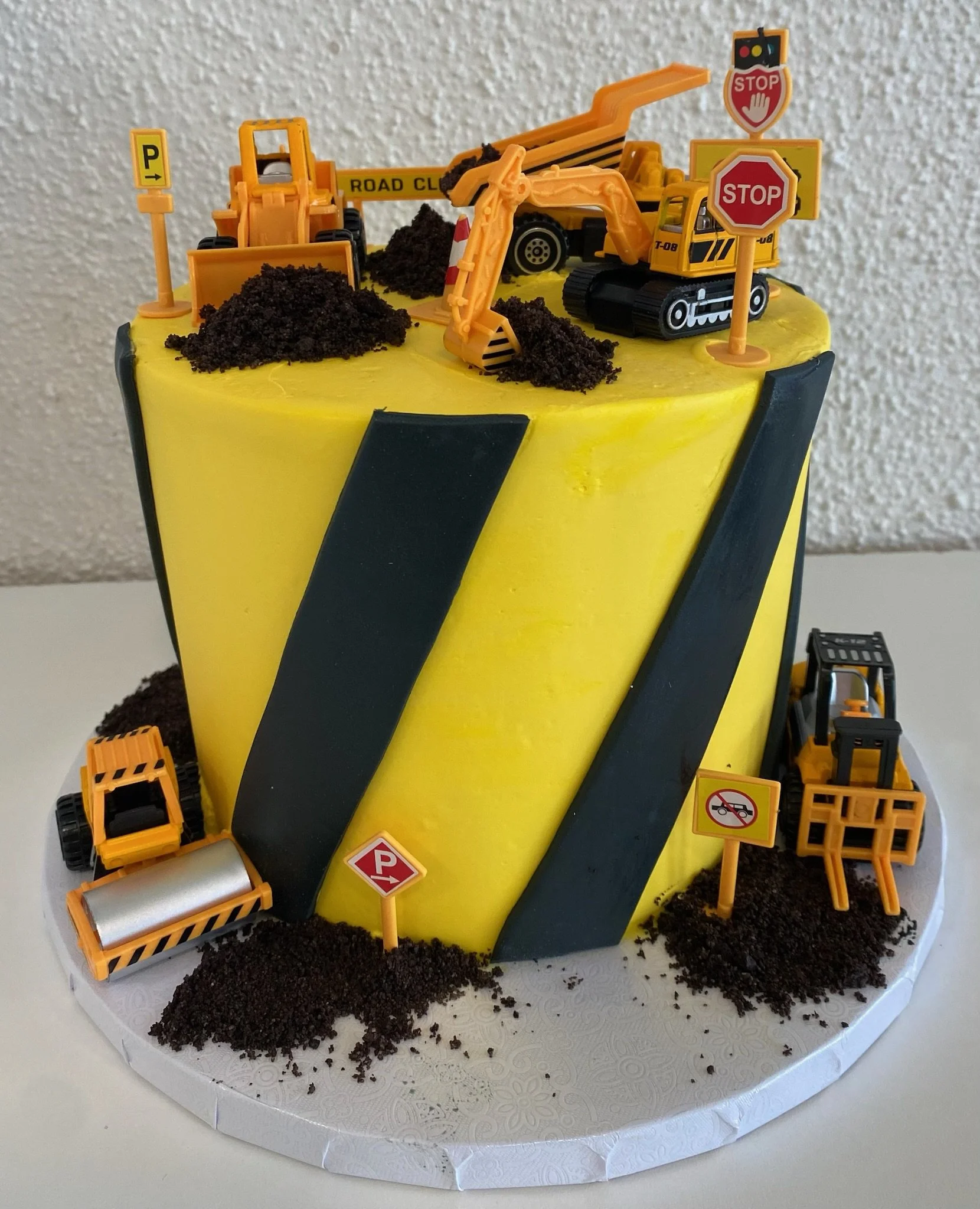 Yellow construction excavator truck birthday cake