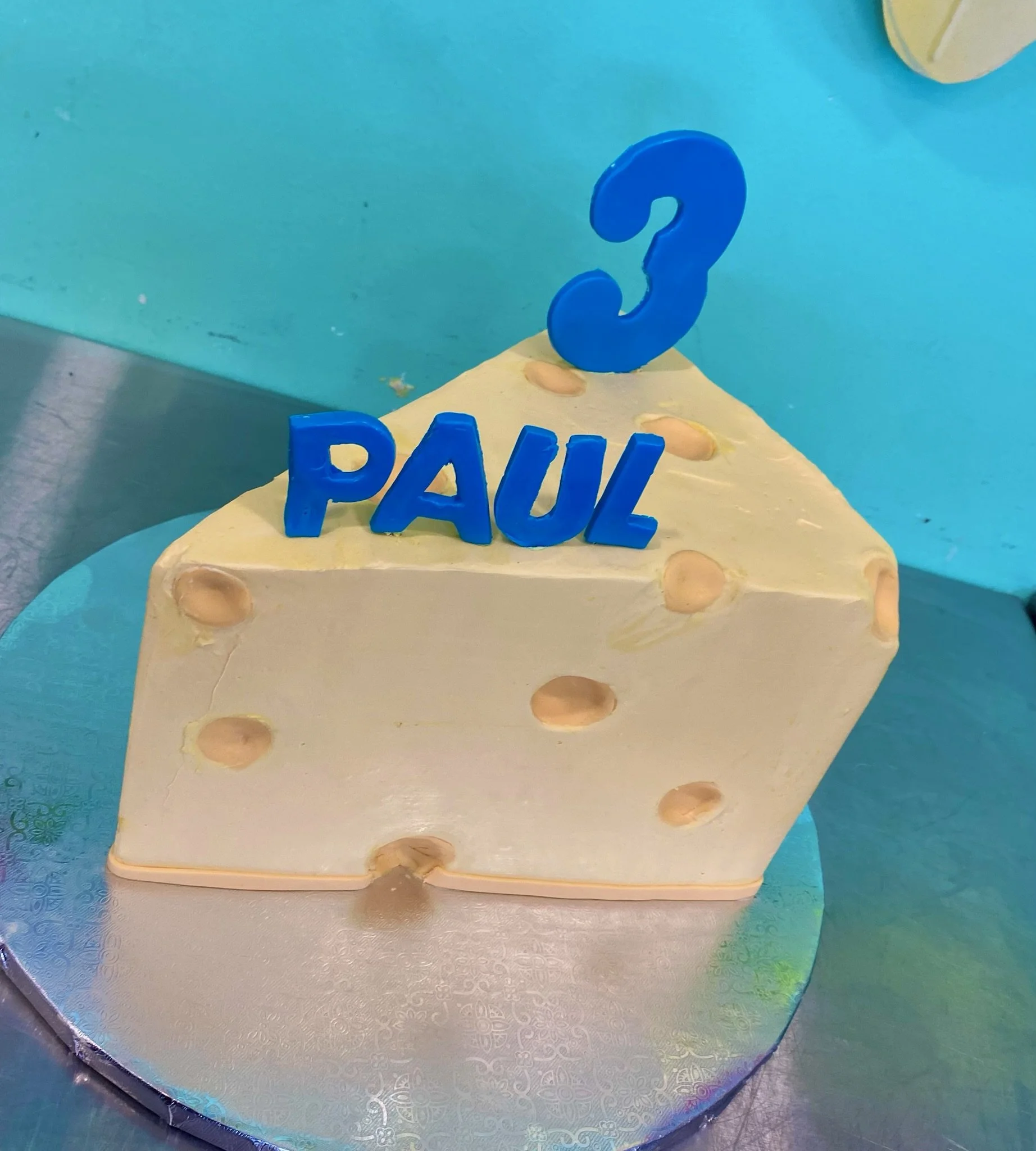Cheese wedge sculpted birthday cake