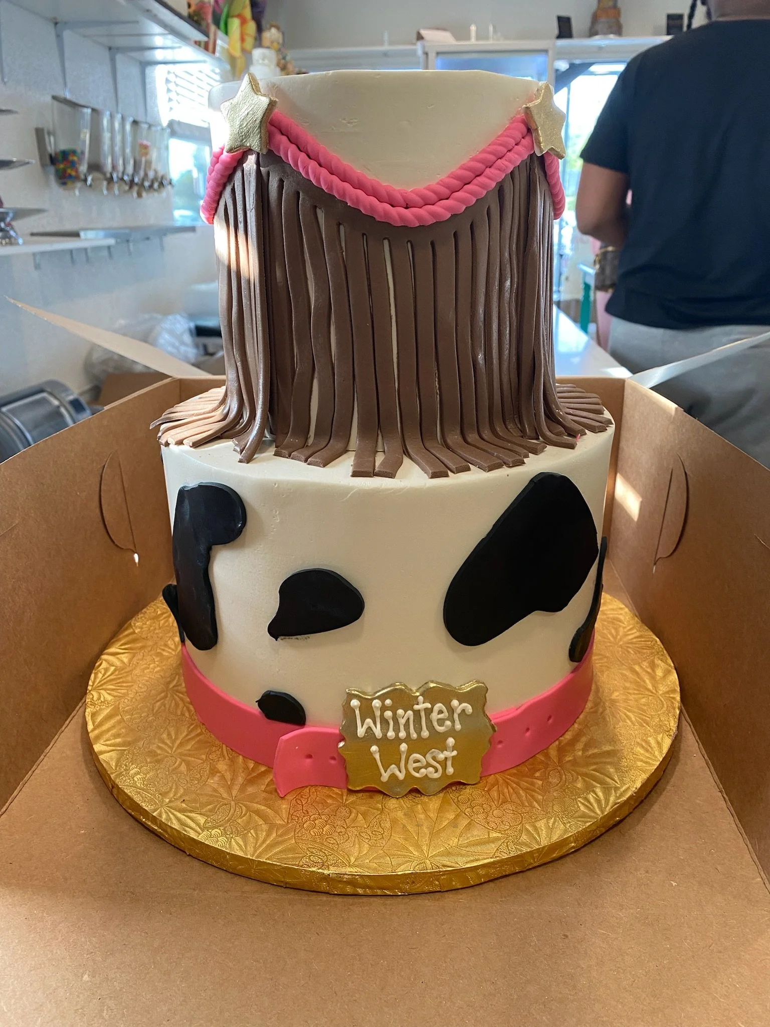 Brown cow print western ranch birthday cake