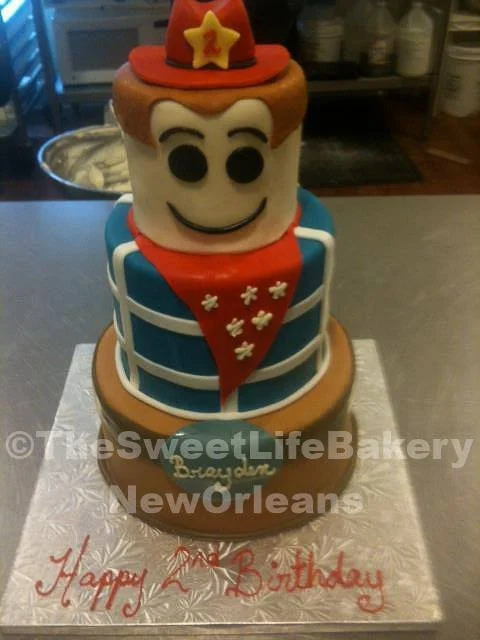 Brown red toy nutcracker christmas birthday cake