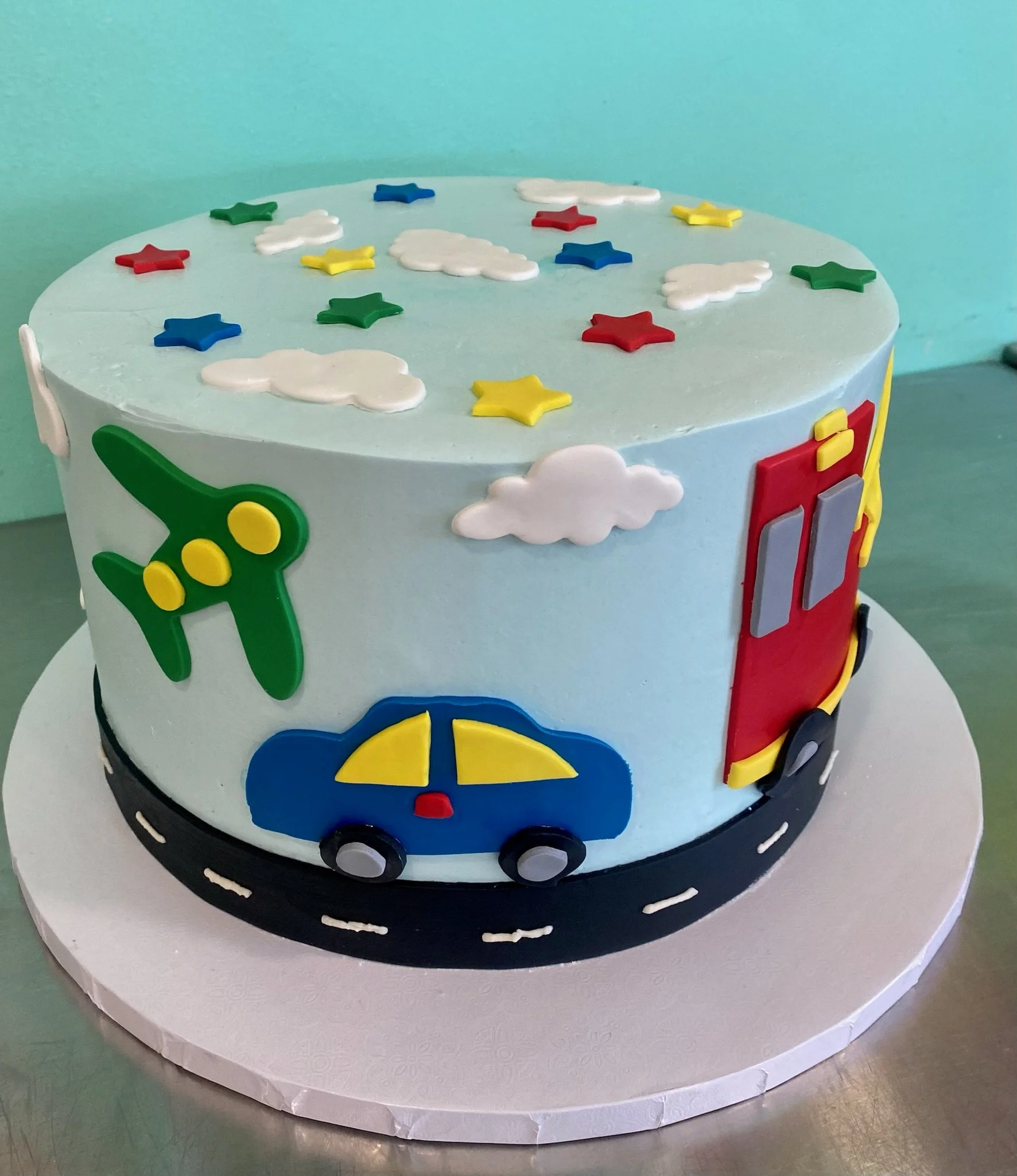 Blue cartoon toy cars first birthday cake