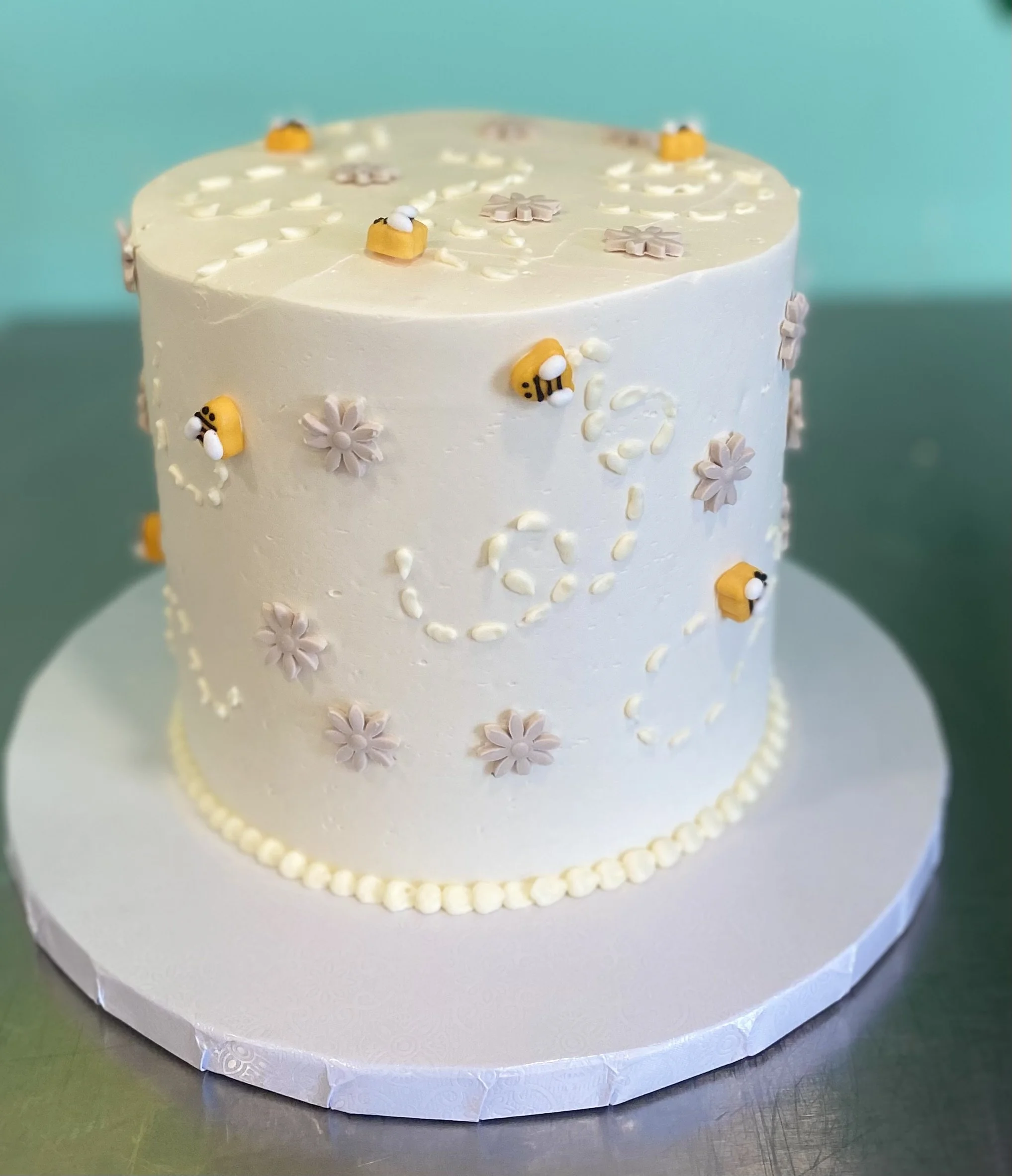 White simple birthday cake metallic gold decoration