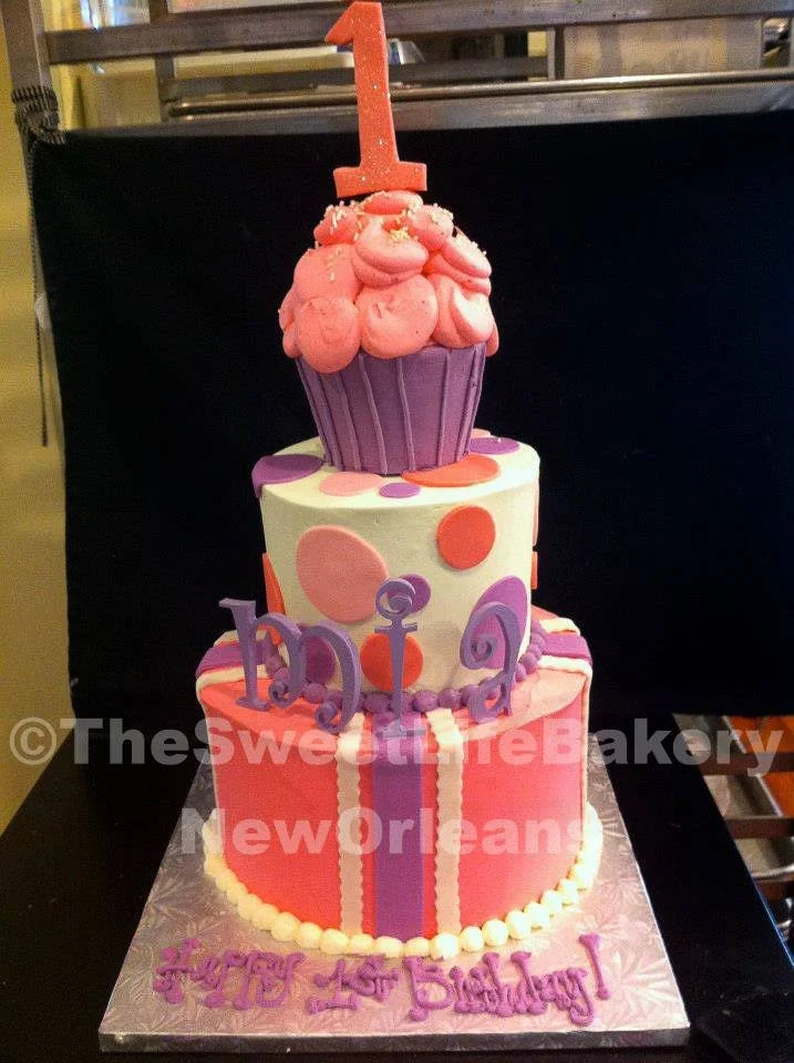 Pink striped two tier character birthday cake