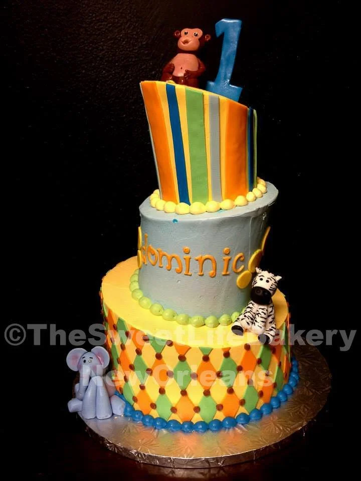 Rainbow colorful stacked tall birthday cake