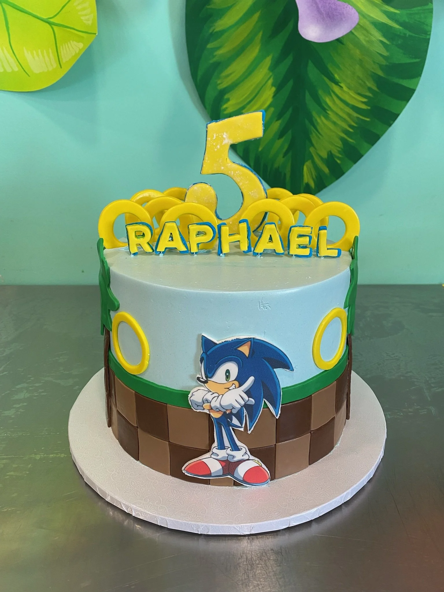 Blue yellow teenage mutant ninja turtle birthday cake