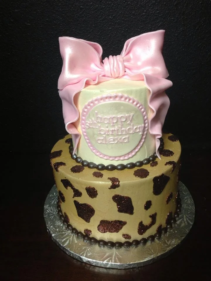 Gold black leopard print pink bow cake