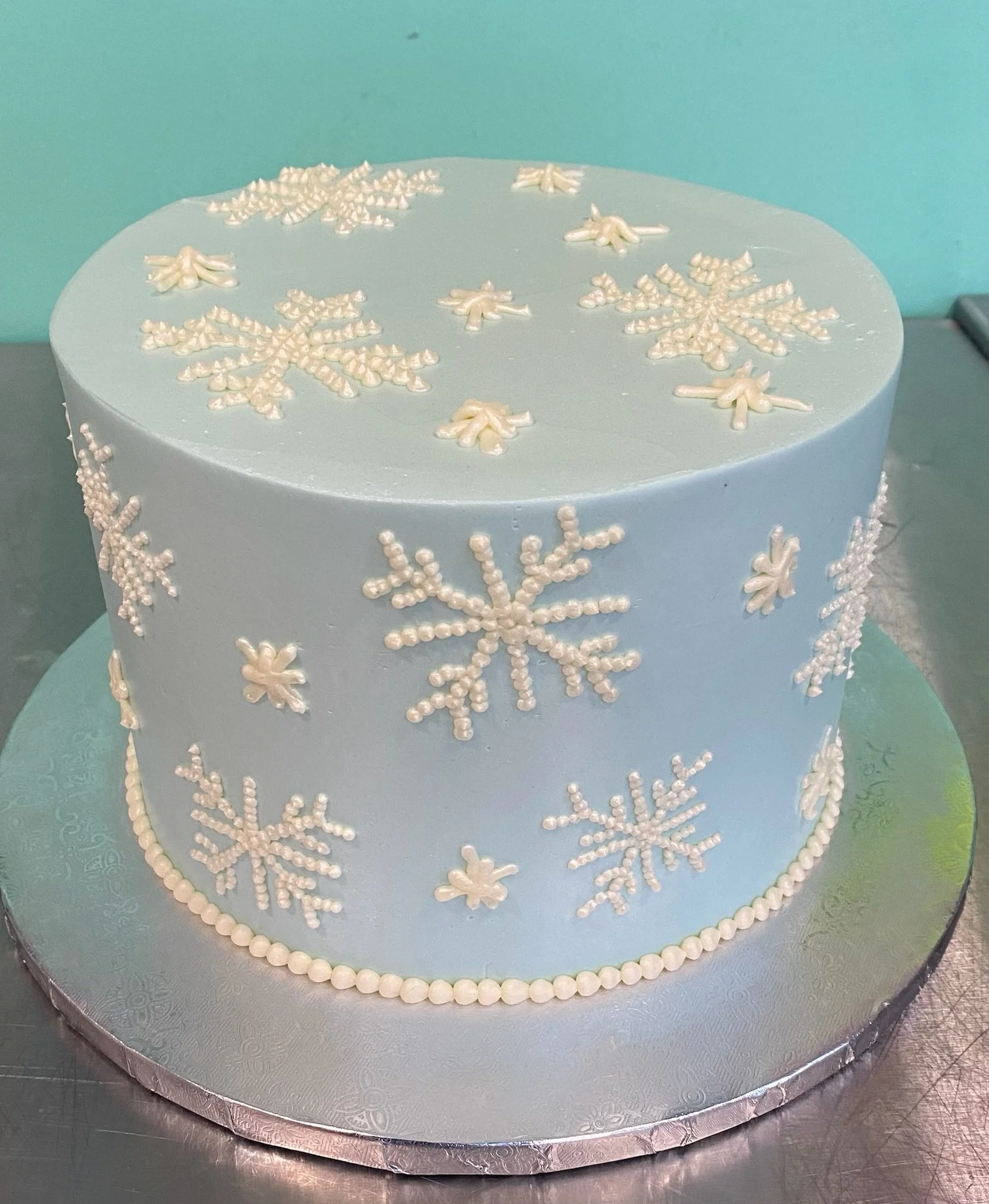 Blue white snowflake winter wonderland cake