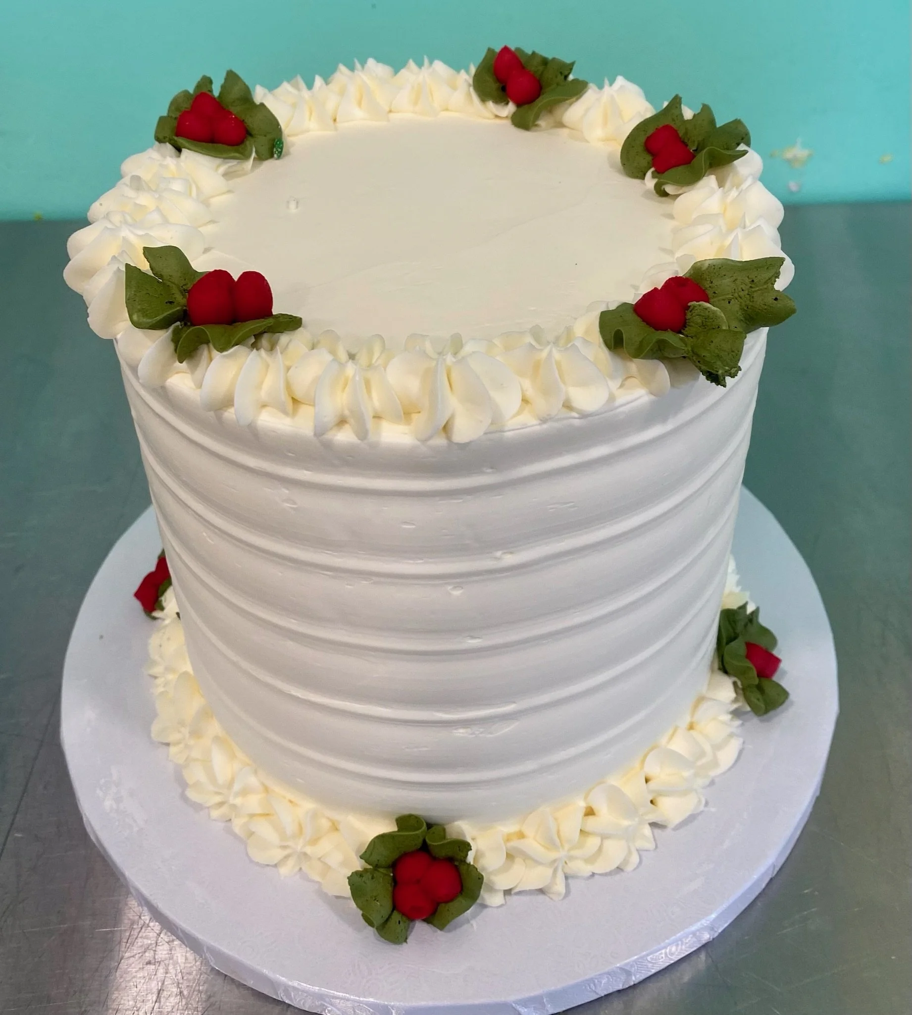 White Christmas cake wreath holly berries