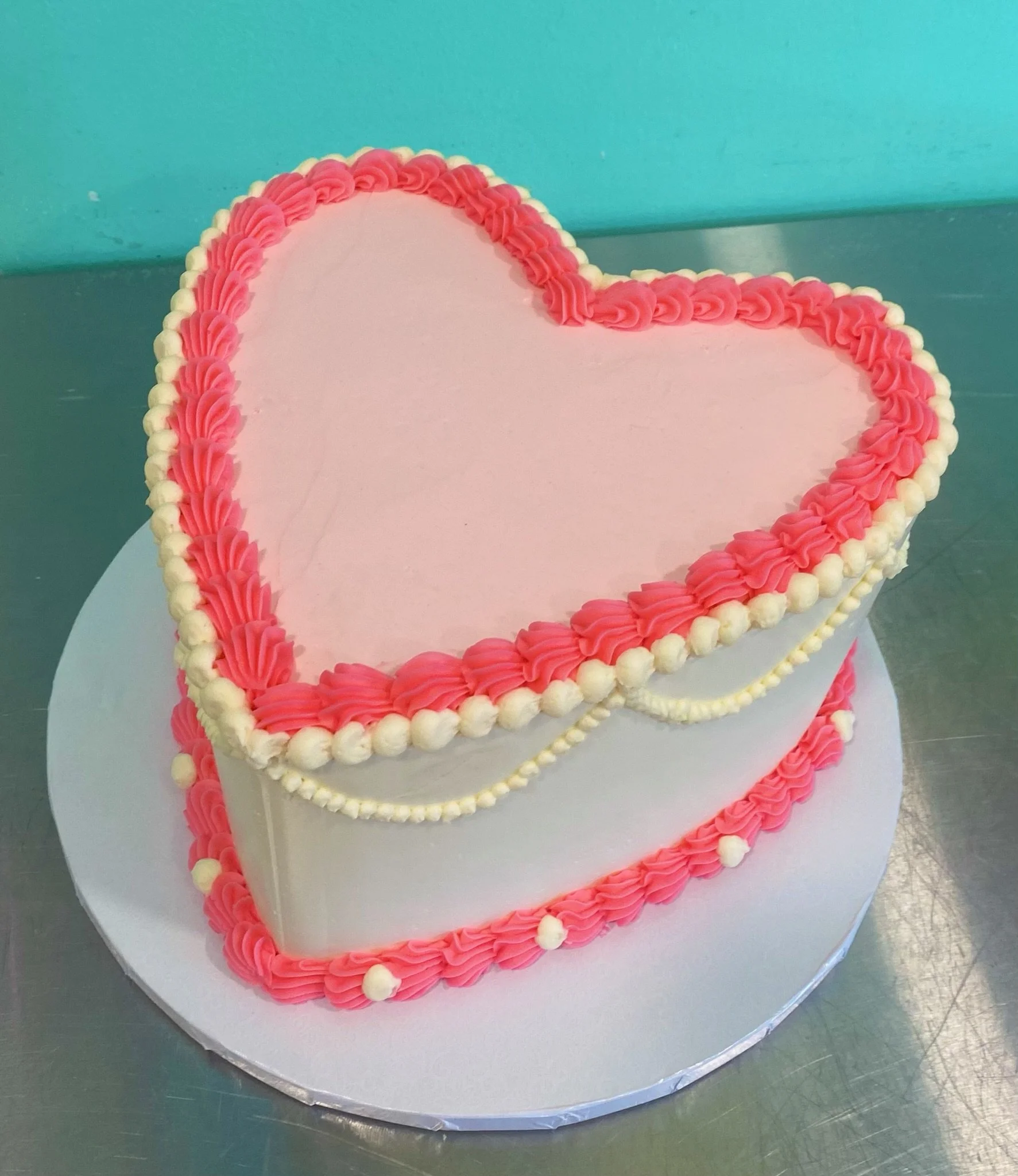 White red heart shaped valentines cake
