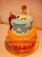 Orange navy blue graduation mascot cake