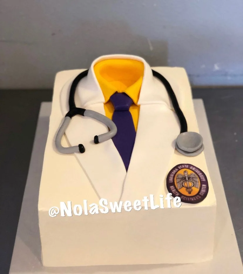 White doctors coat stethoscope medical graduation cake