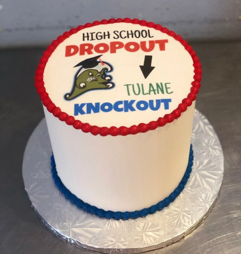 White blue red high school graduation cake mascot