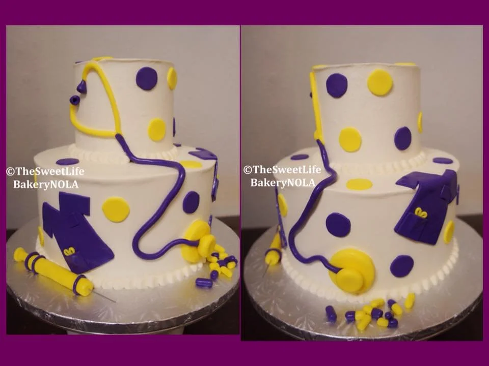 Yellow purple LSU graduation layered cakes
