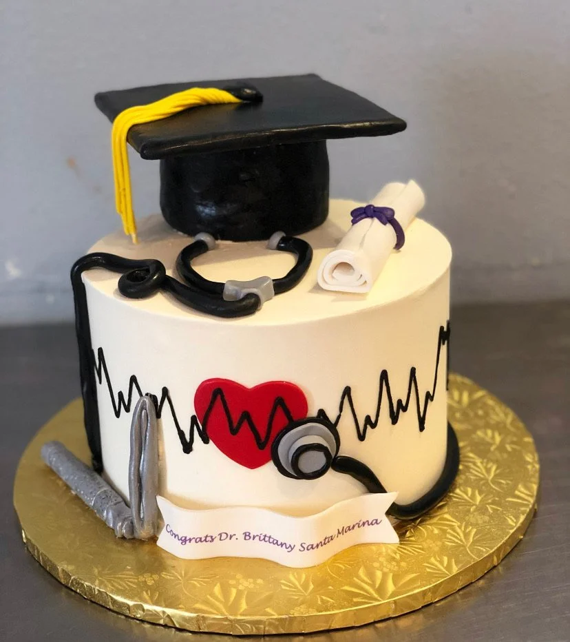 White black graduation cap cake