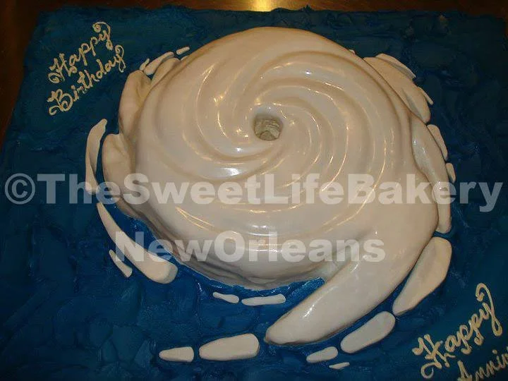 White ivory graduation cake ruffled frosting