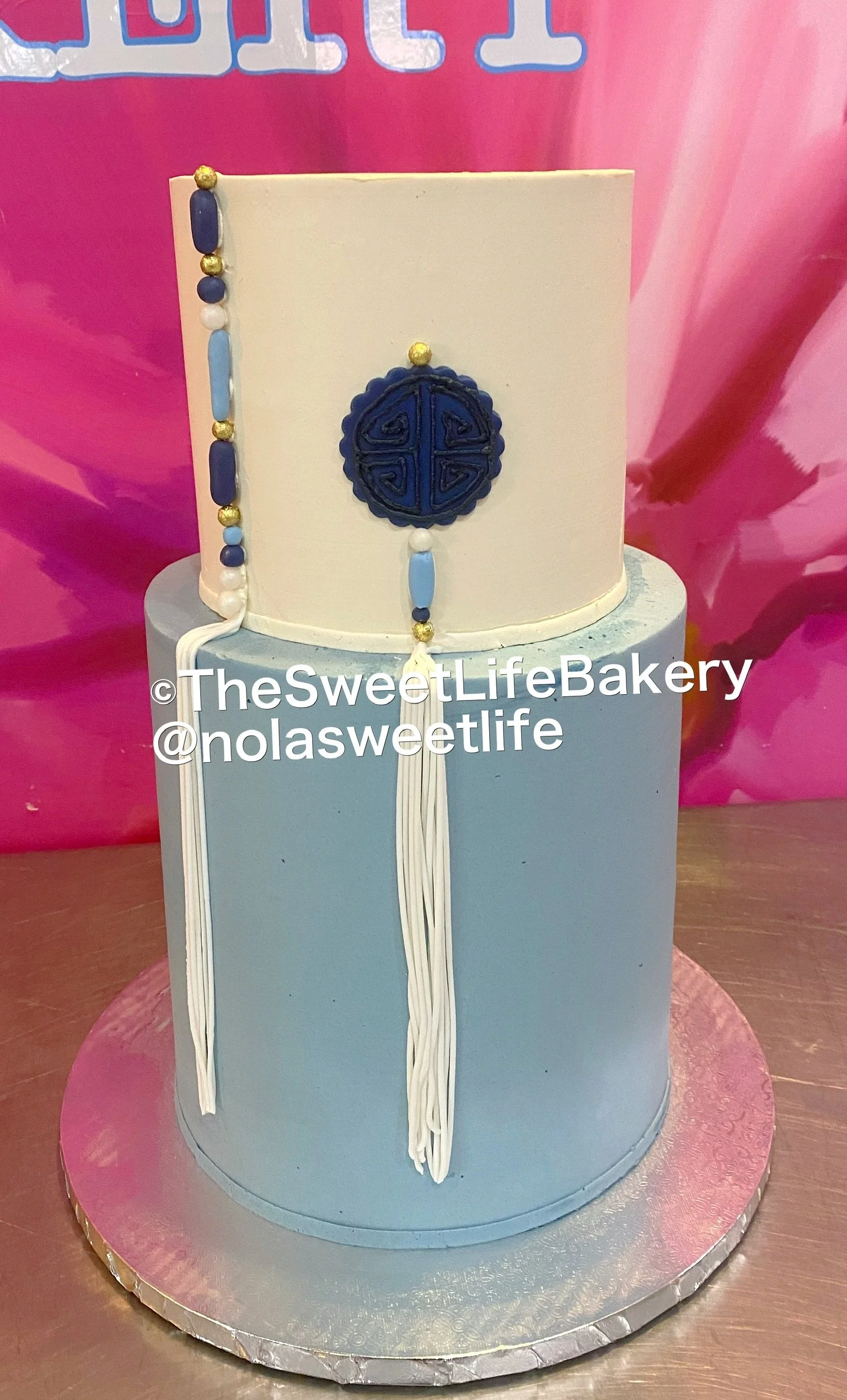 Blue pastel graduate cap diploma cake