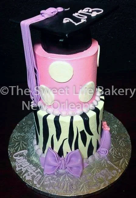 Pink black class graduation cake tassel