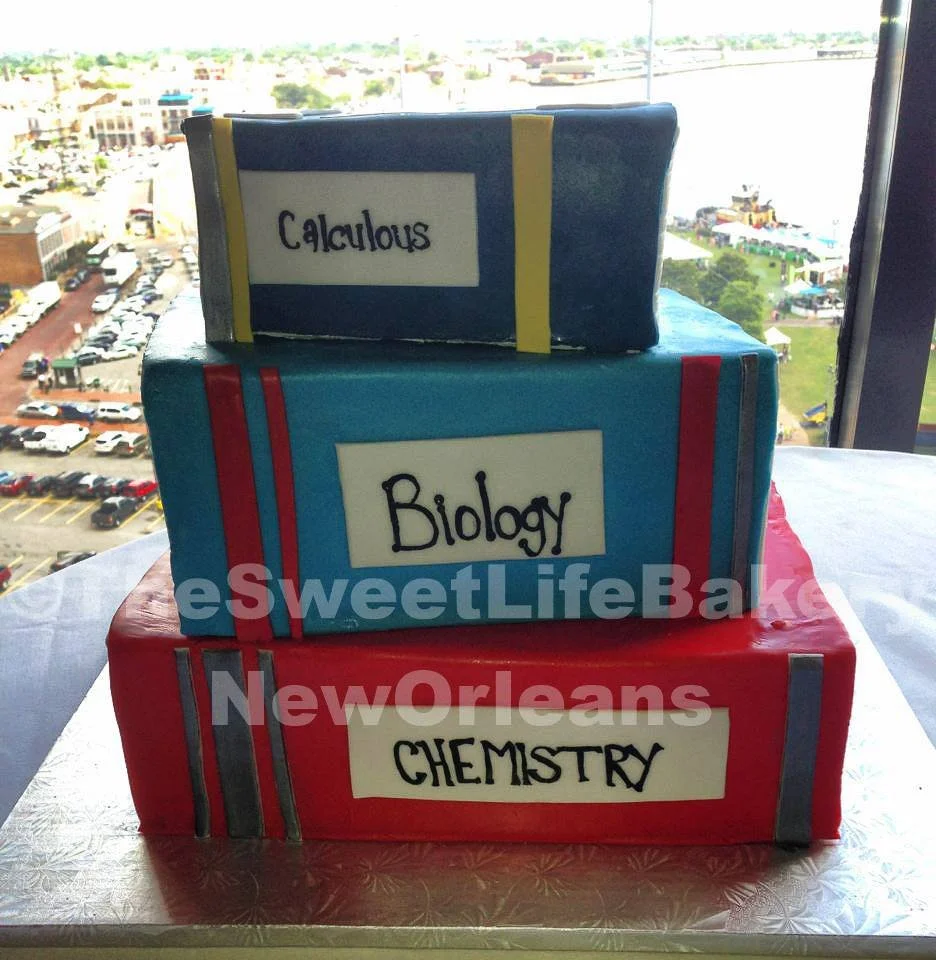 Stacked textbooks education chemistry school graduation cake