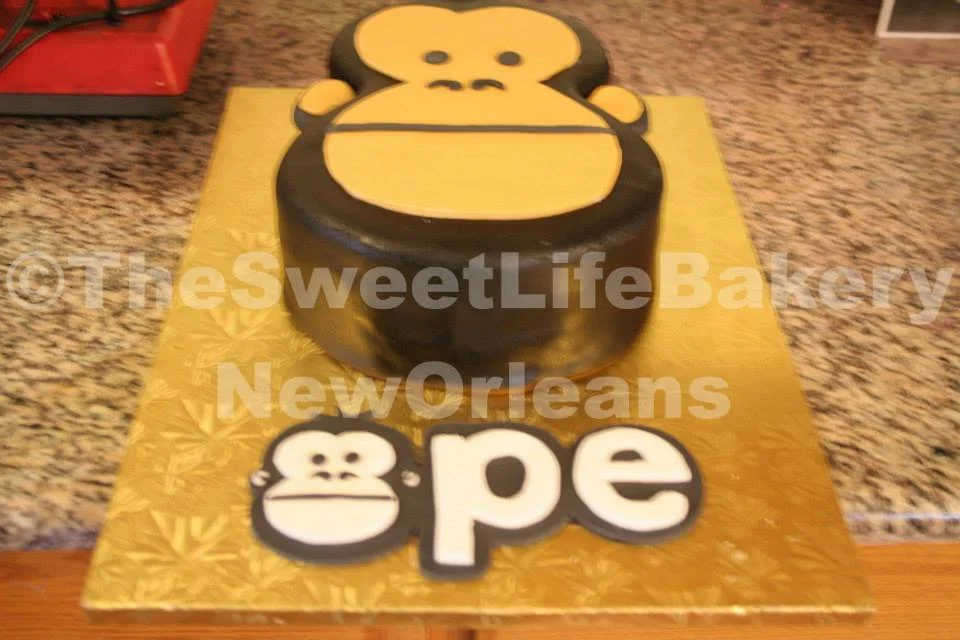 Yellow brown gorilla monkey graduate cake