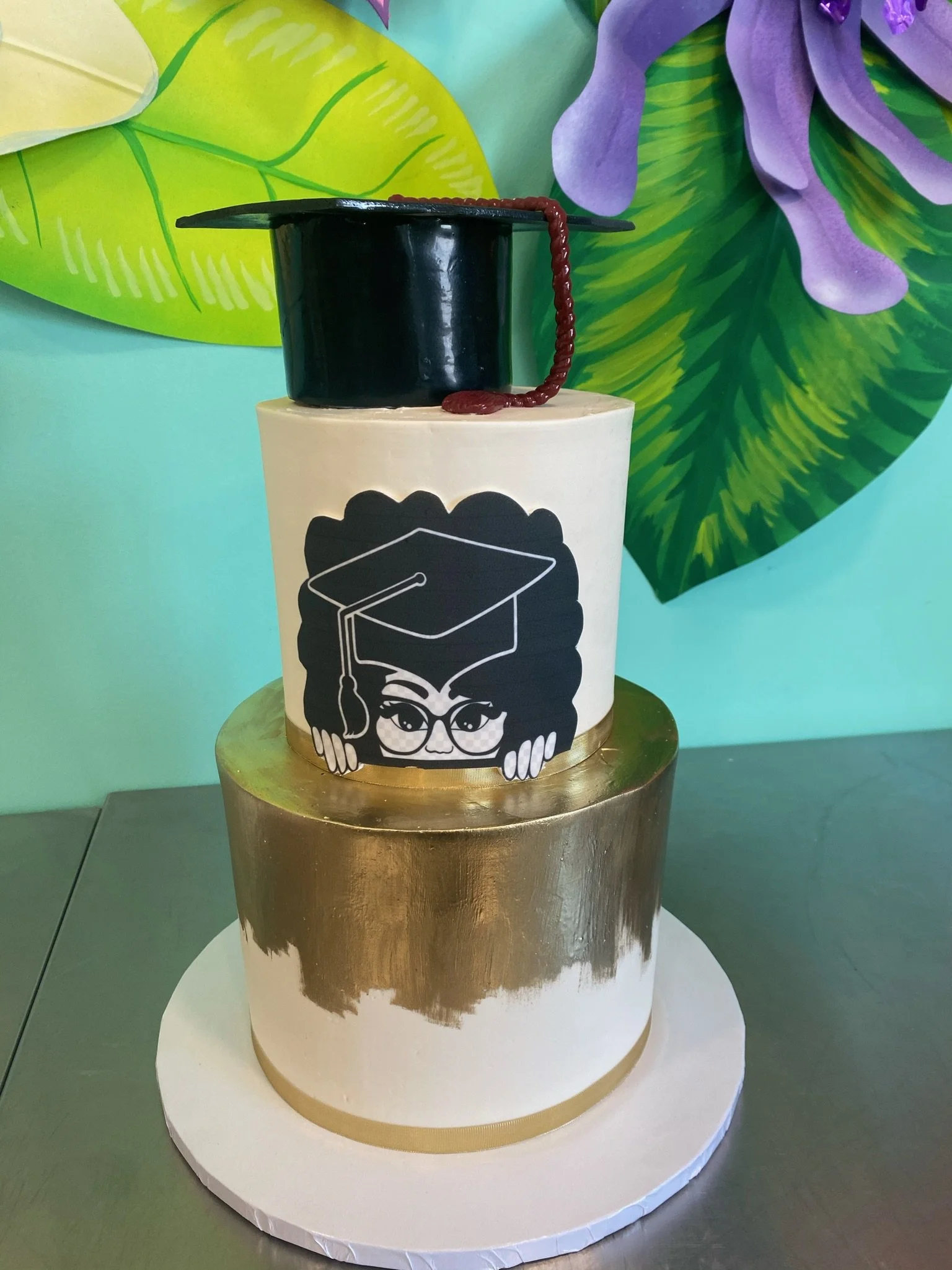 Black white gold graduation cap two tier cake