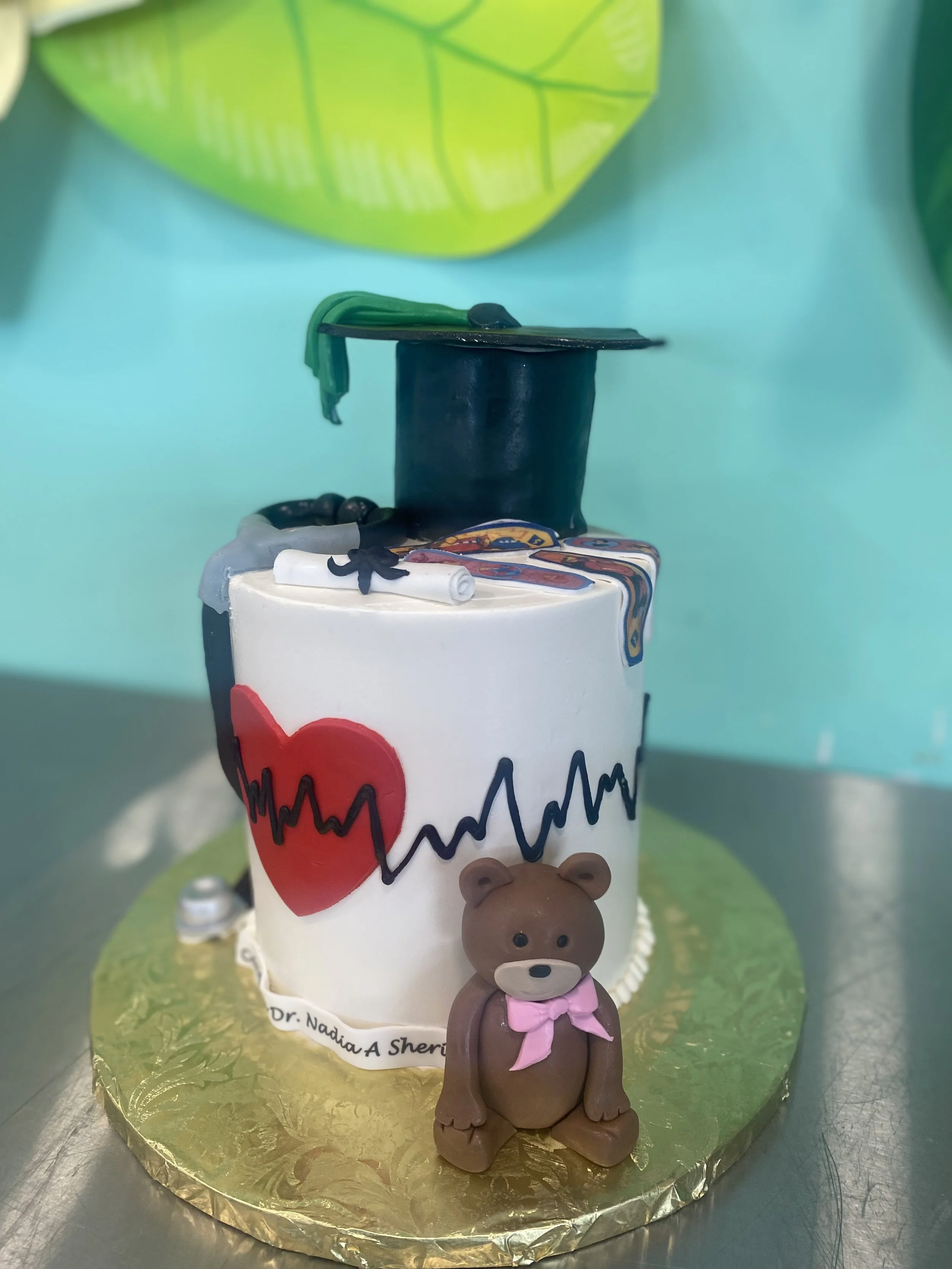 Medical nurse graduation white scrubs cake