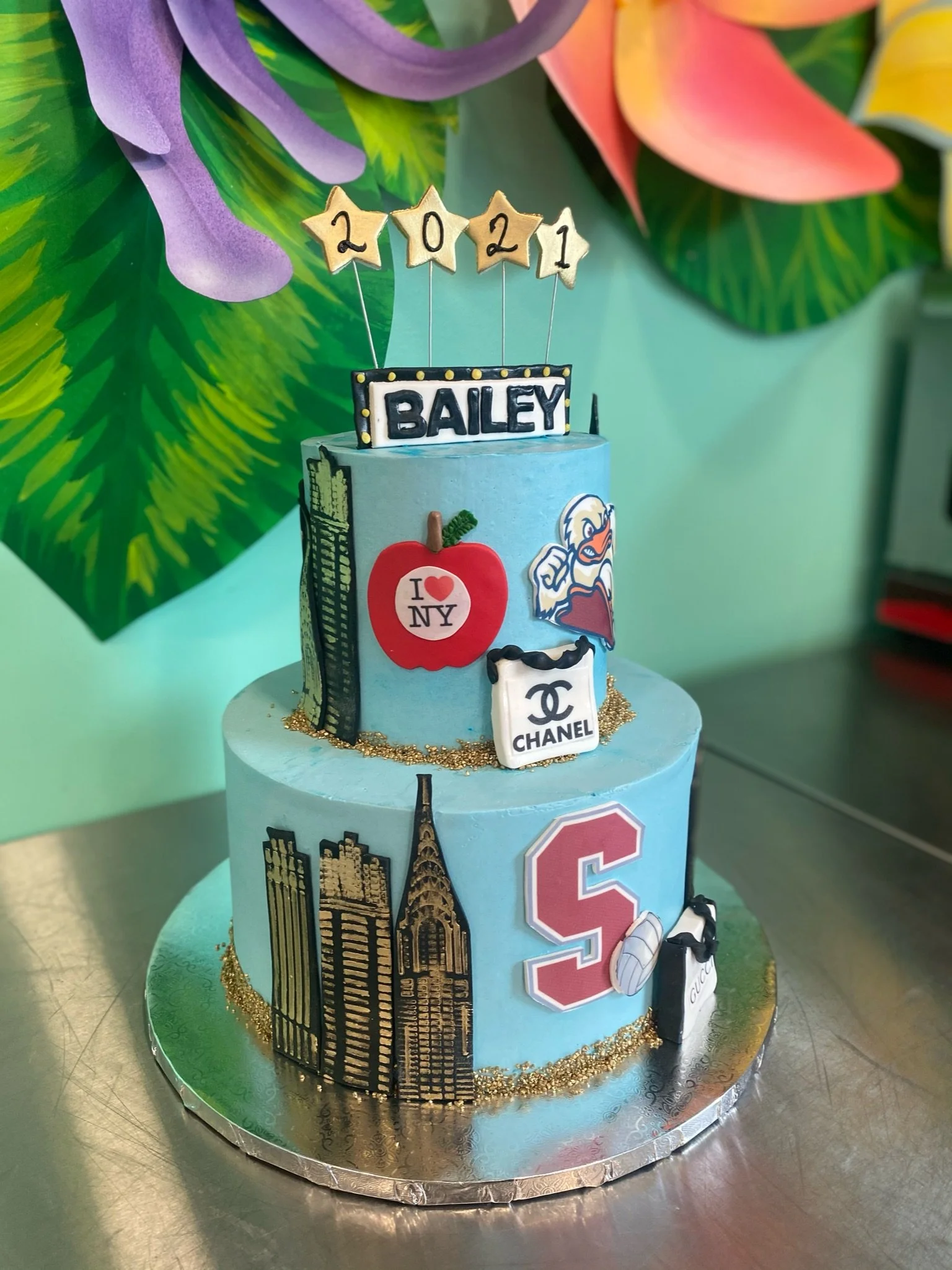 Blue red medical graduate cake books