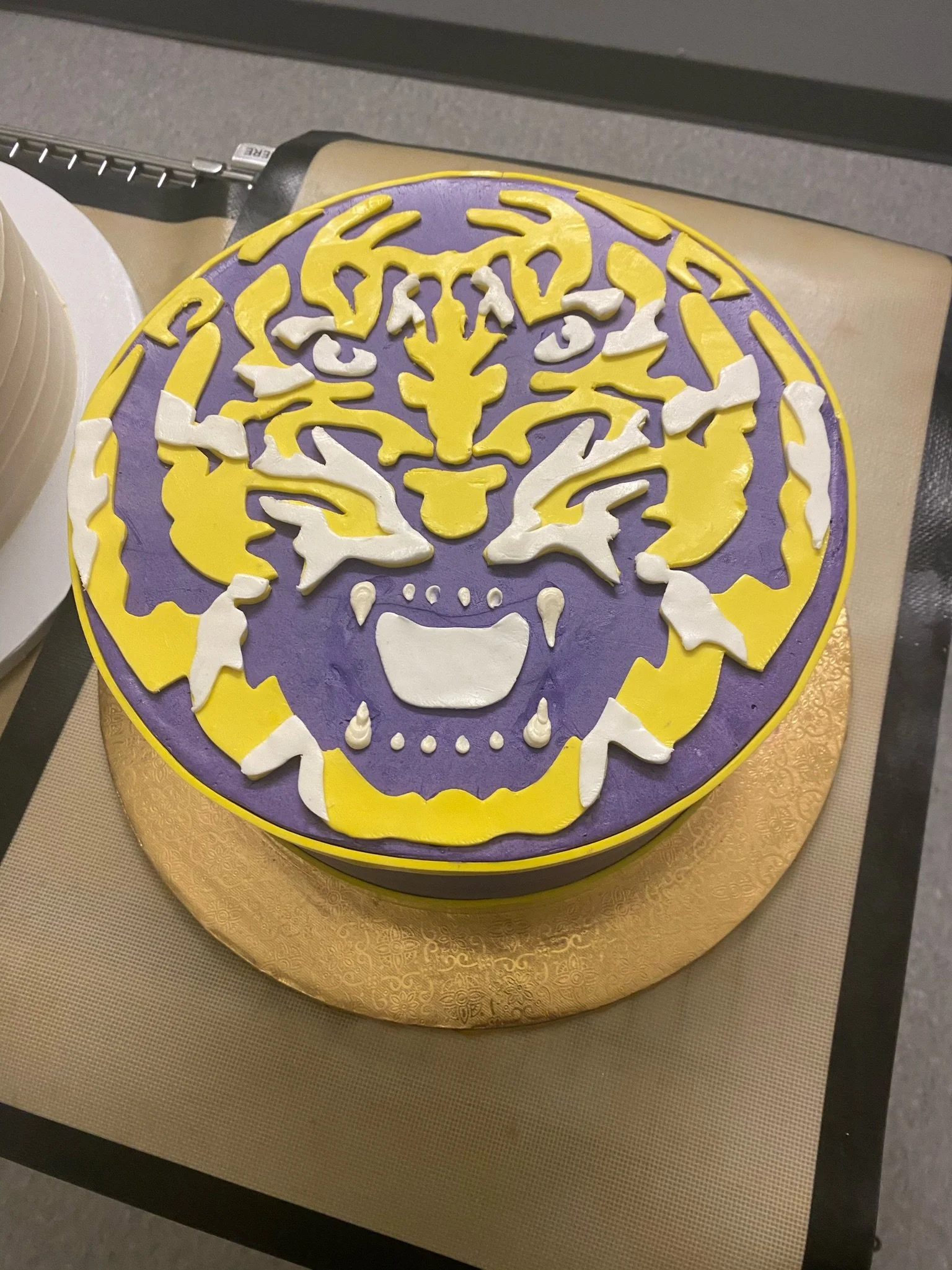 Purple gold LSU tigers graduation cake