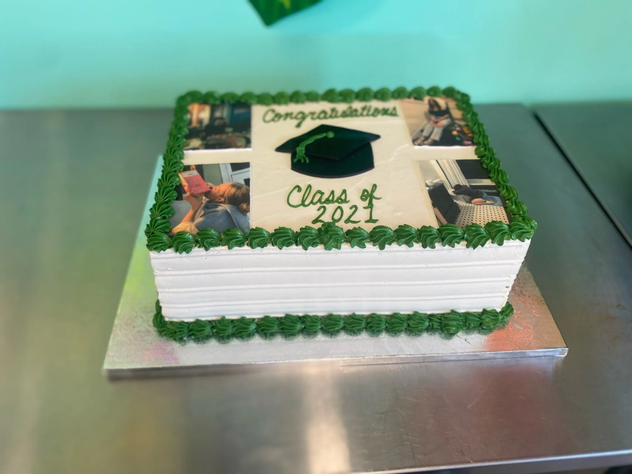 Green white graduation cap rectangular cake