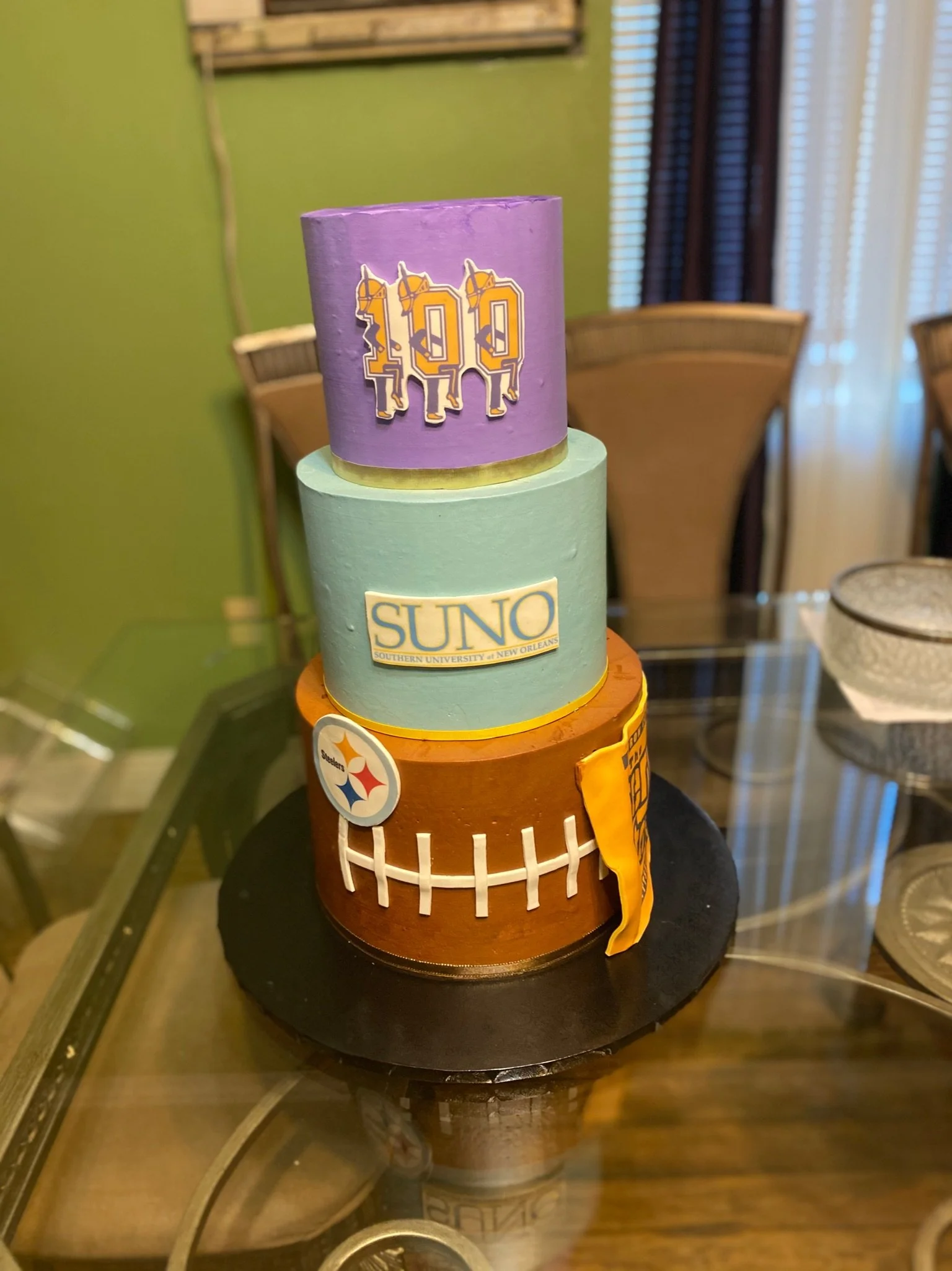 Green gold university graduation cake stacked books