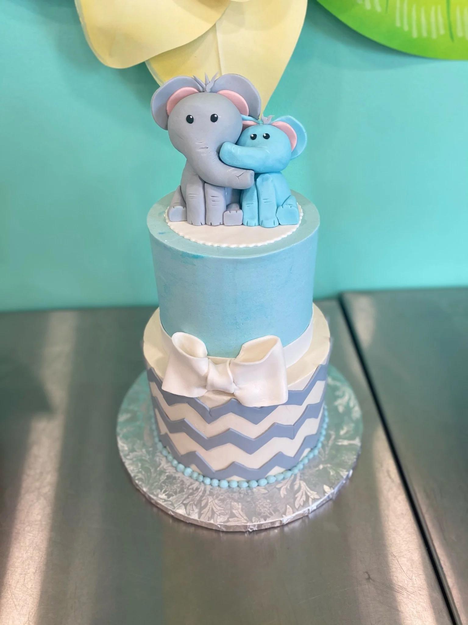 Blue white elephant baby shower tiered cake