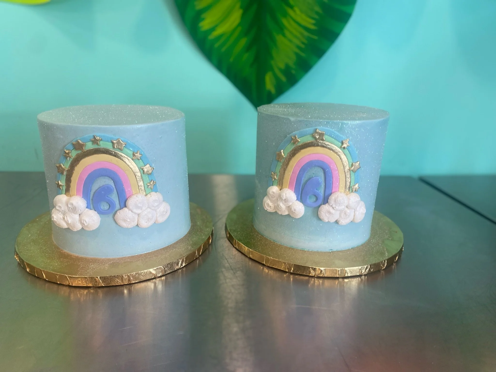 Blue rainbow clouds first birthday baby shower mini cakes