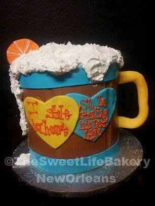 Orange gold baby shower beer mug cake