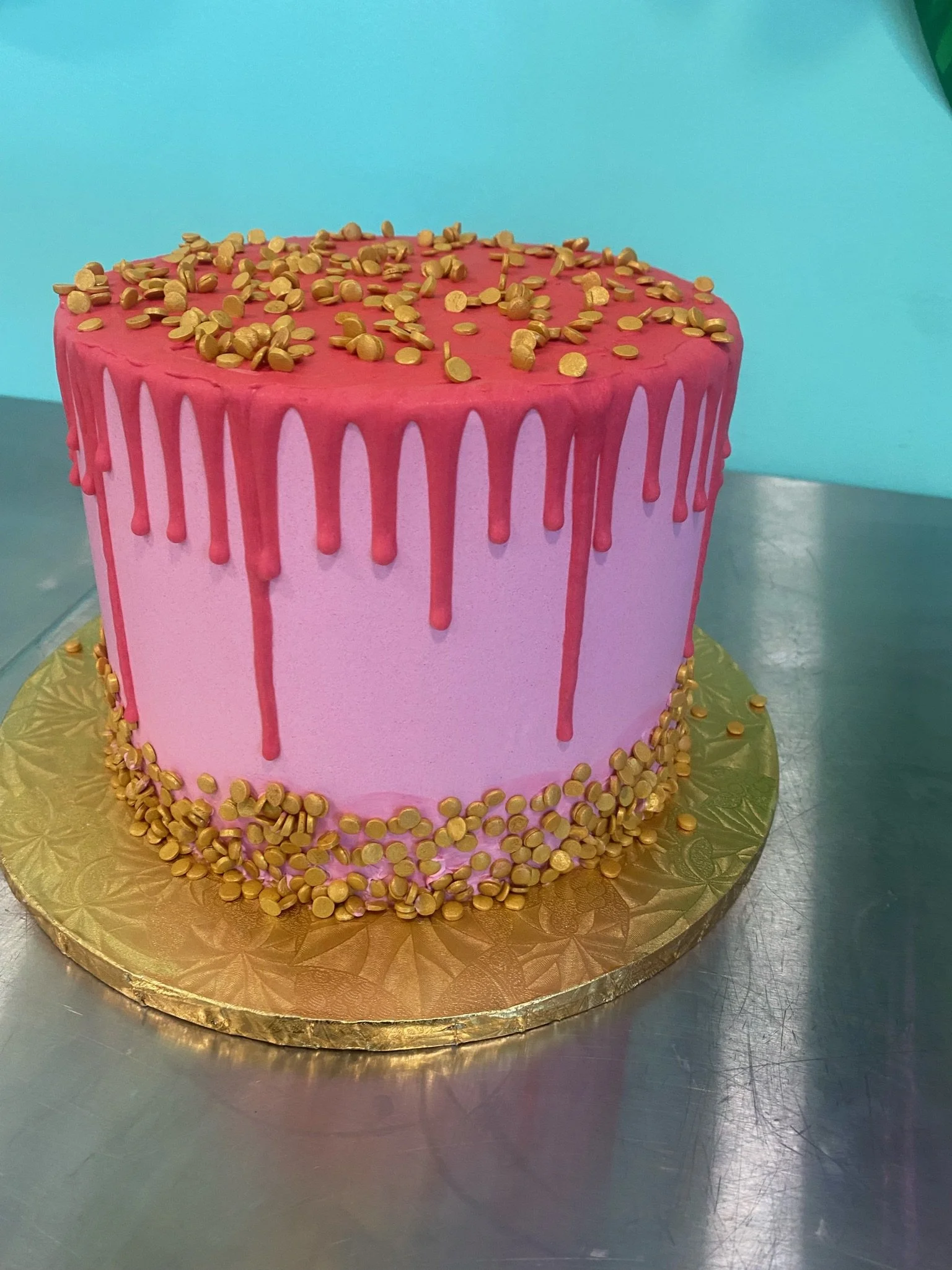 Pink gold sprinkles drip baby shower cake