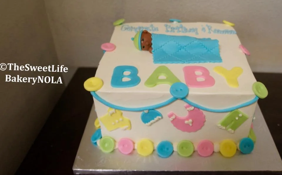 Baby shower white floral cake pastel shapes