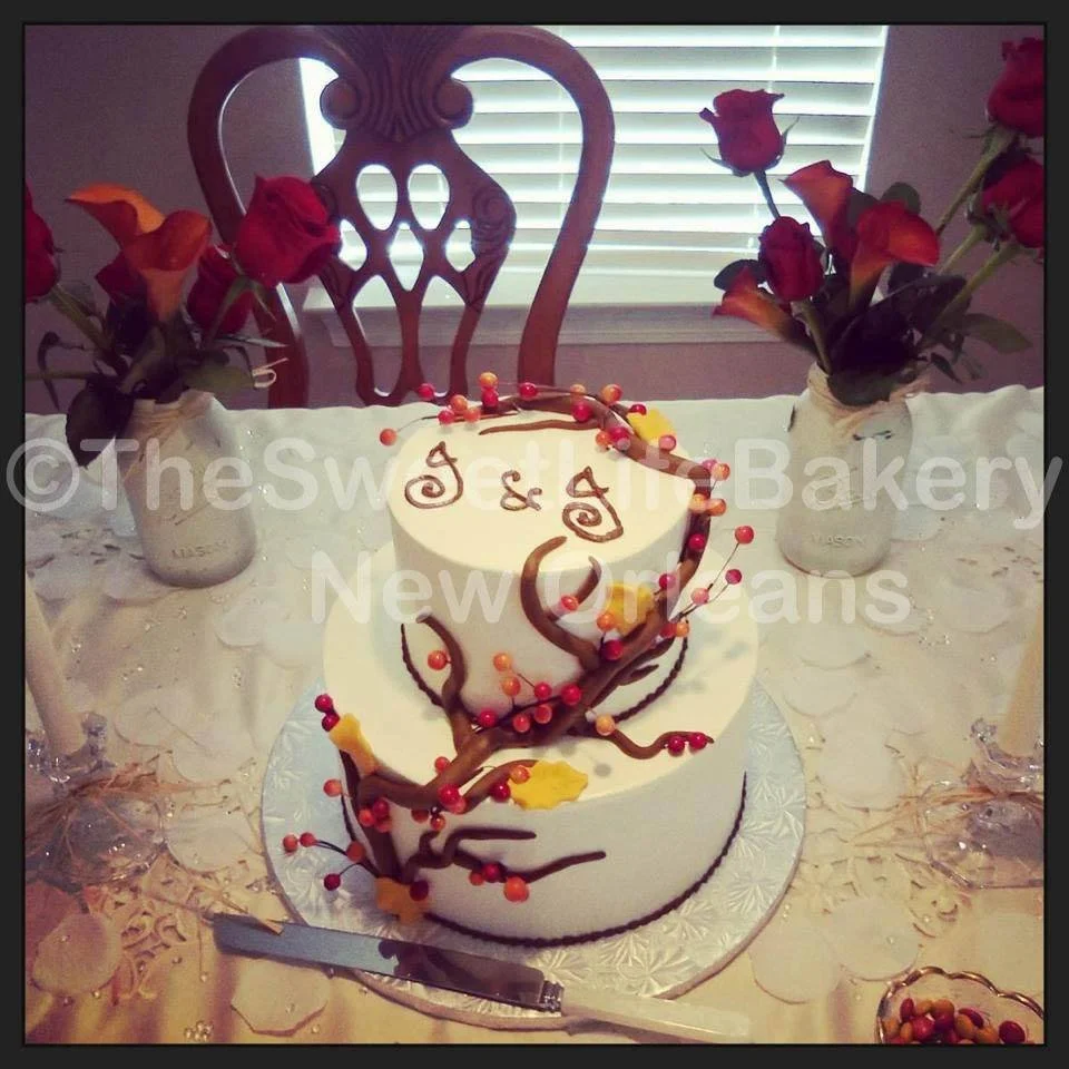 White pink floral baby shower cake red flowers