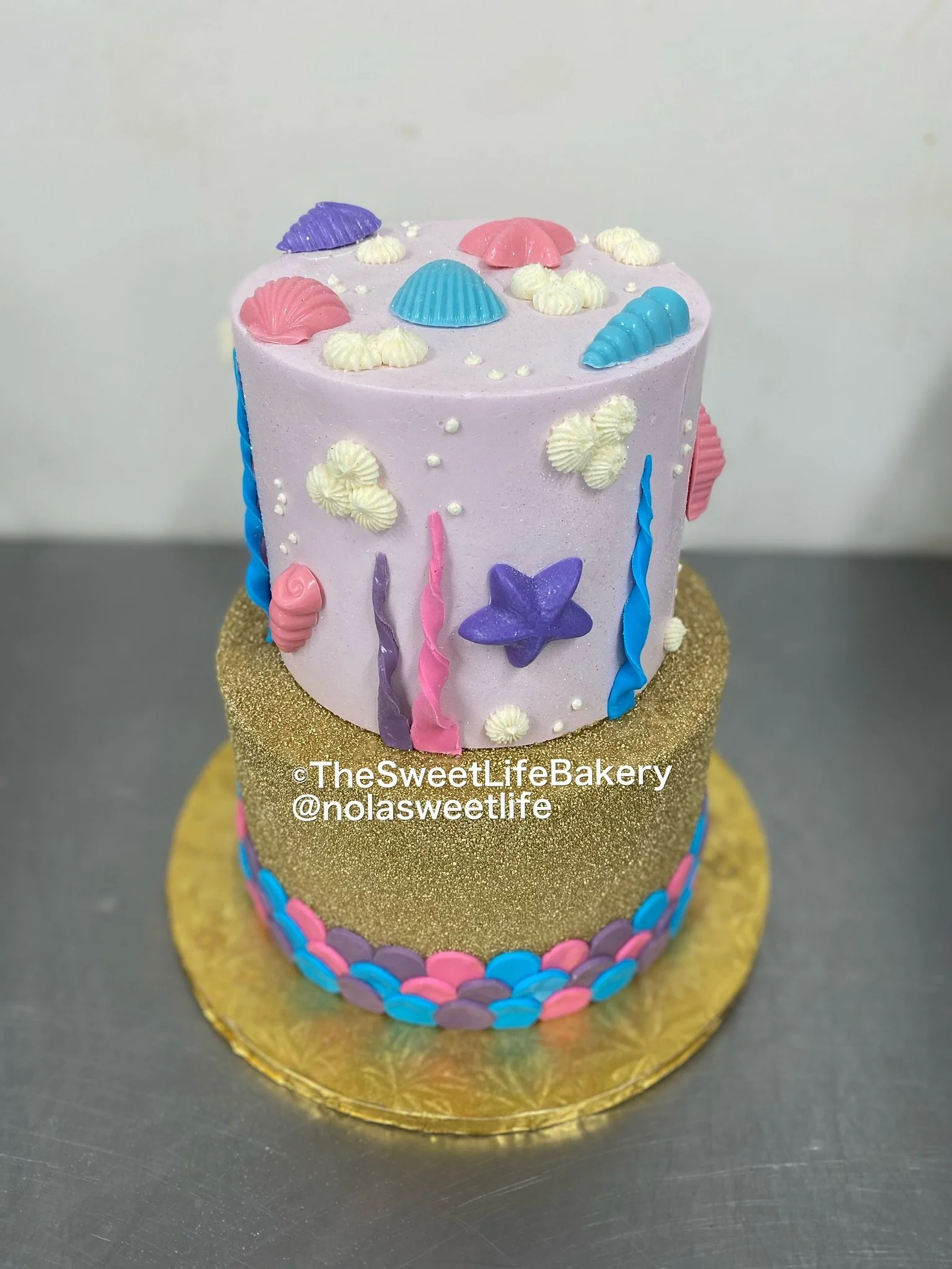 Pink blue baby shower themed cake two tier