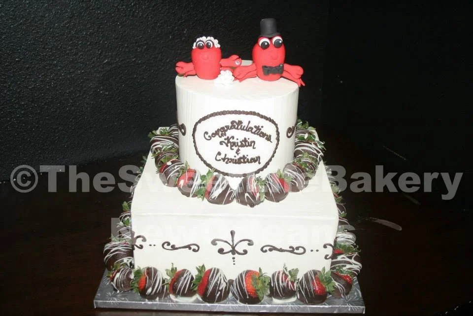 White pink baby shower cake flowers