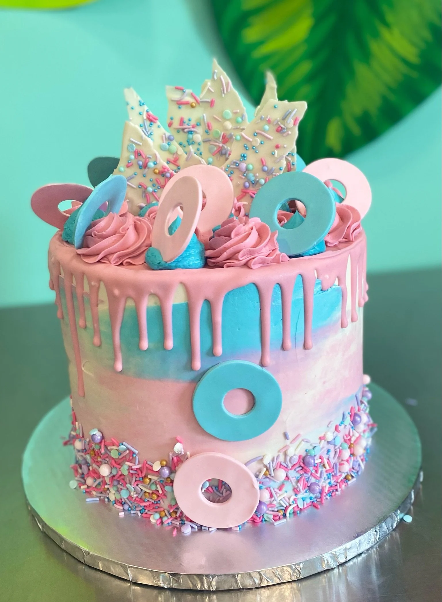 Pink blue gold floral baby shower cake